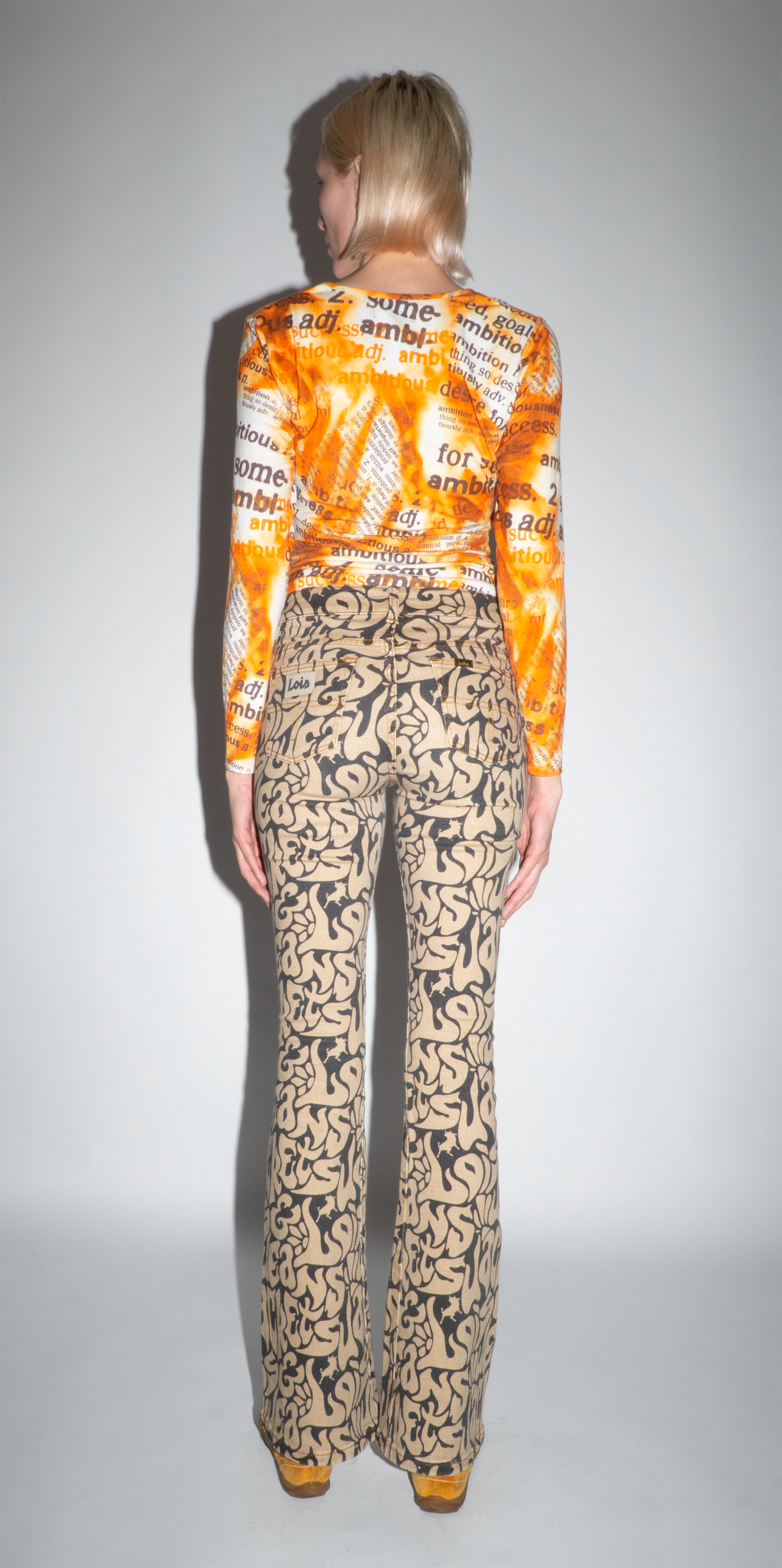 Lois All Over Monogram Print Flared Trouser